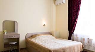 Хостел Check Inn Воронеж Стандартный двухместный номер с 1 кроватью или 2 отдельными кроватями-1